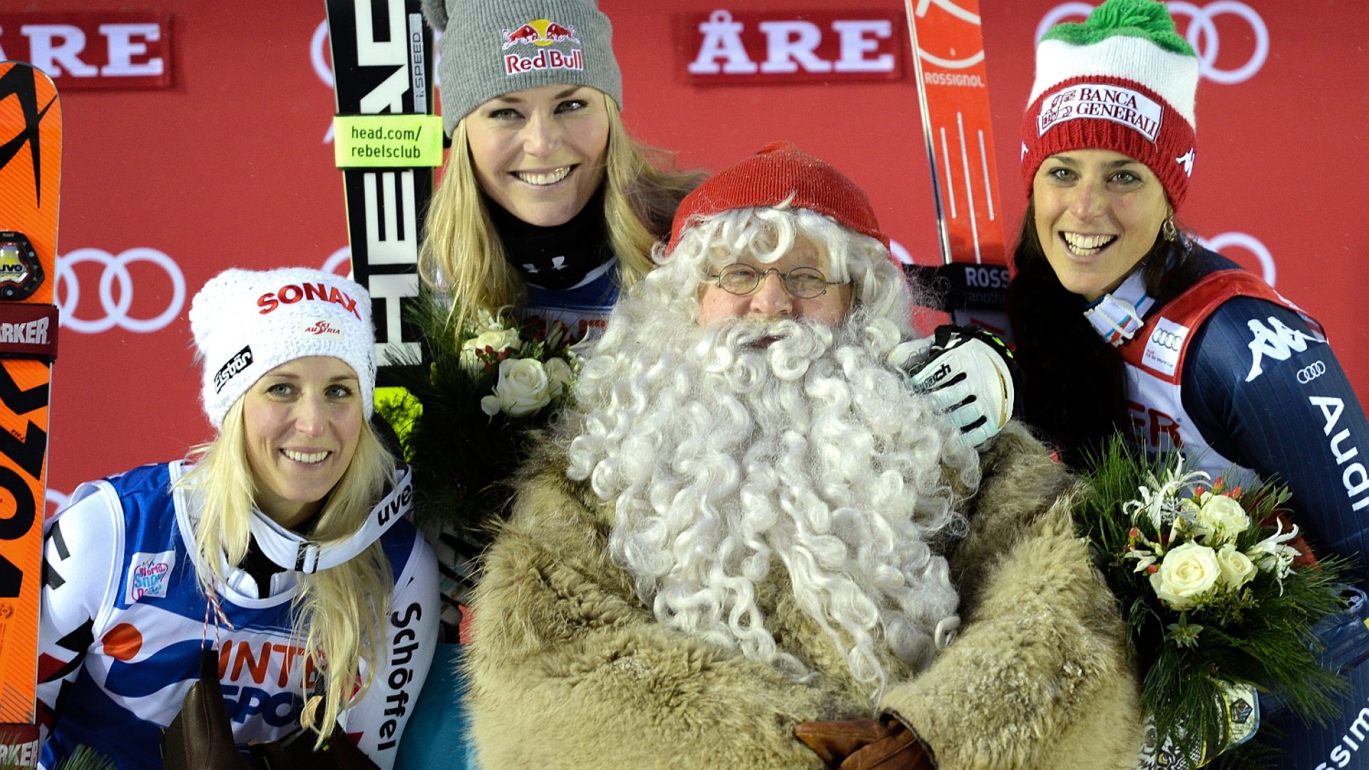 eva-maria-brem-2nd-lindsey-vonn-1st-and-federica-brignone-3rd-celebrate-after-the-super-g-in-are